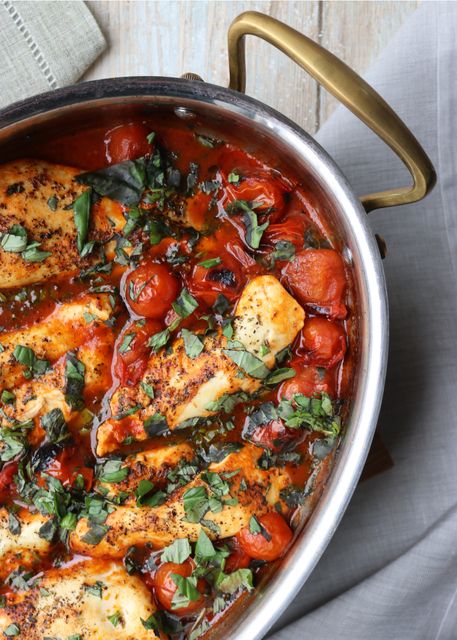 Roasted chicken with fresh Cherry tomatoes and basil